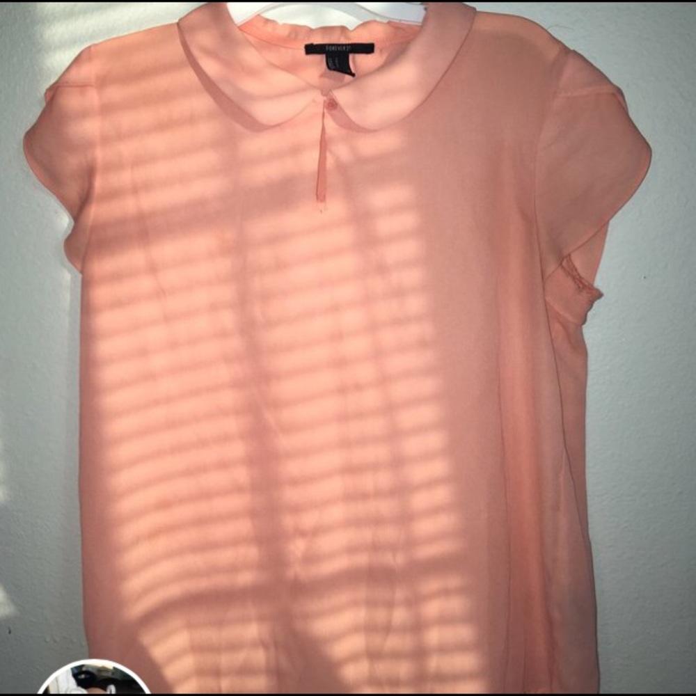 Pink collared blouse with keyhole on front